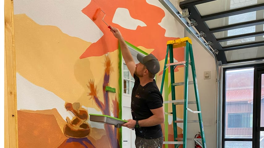 Skye Walker painting mural for Hydrotherapy Room. (Courtesy of Skye Walker)