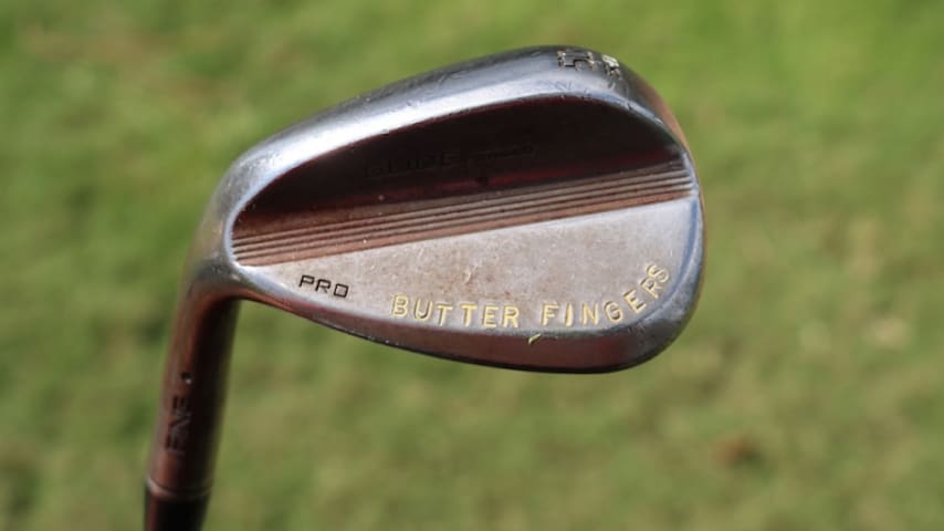 A look at Matt McCarty's 50-degree wedge stamped with “Butter Fingers.” (GolfWRX)